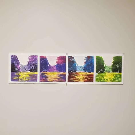 Four small landscape paintings exploring purple, pink, blue, and green seasonal color palettes