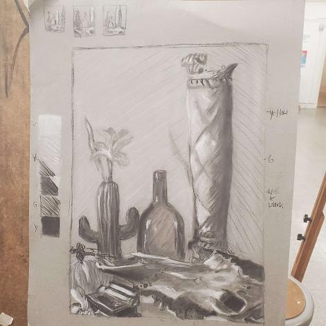 Observational graphite drawing of bottles, a tall patterned vase, and draped objects
